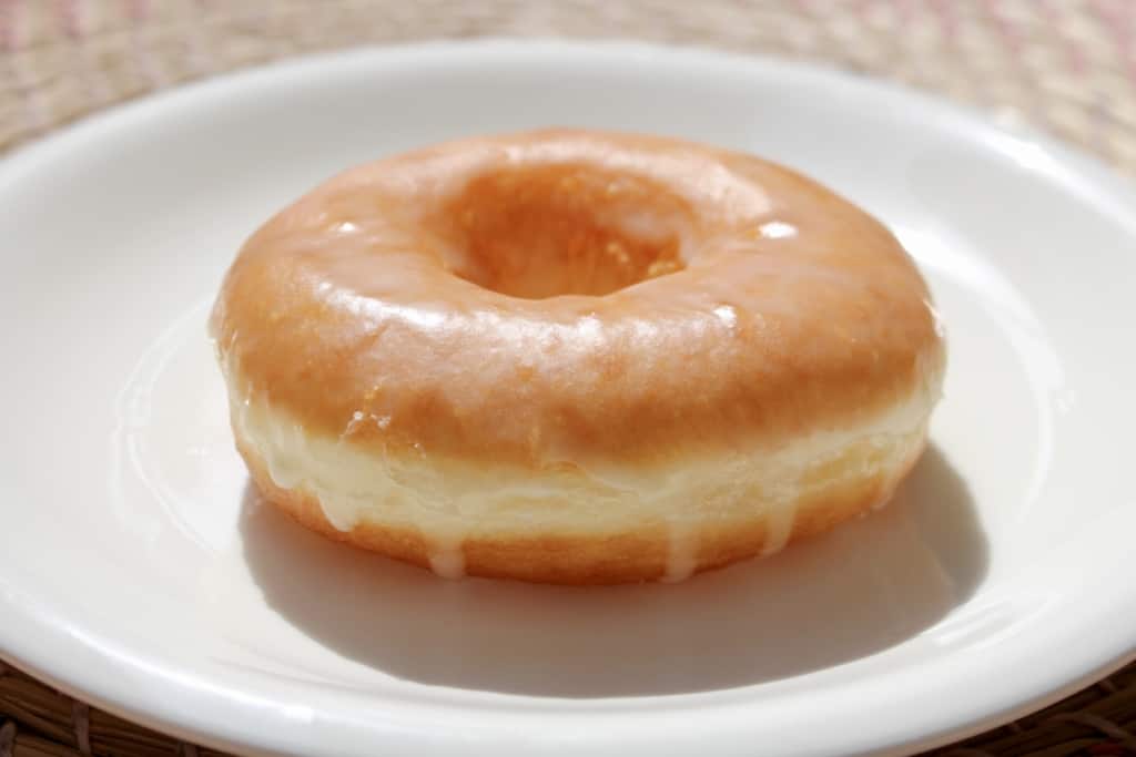 Did you know you can make fluffy and delicious yeasted doughnuts in a bread machine? These homemade doughnuts are going to knock your socks off! Glazed, dipped into chocolate, or covered in cinnamon sugar, do what you want! Go nuts with your doughnuts! #donuts #doughnuts #fluffy #homemade #yeasted #glazed #chocolate #sprinkles #doughnutholes #timbits #dunkindonuts #krispykreme #timhortons #breadmachines #fried