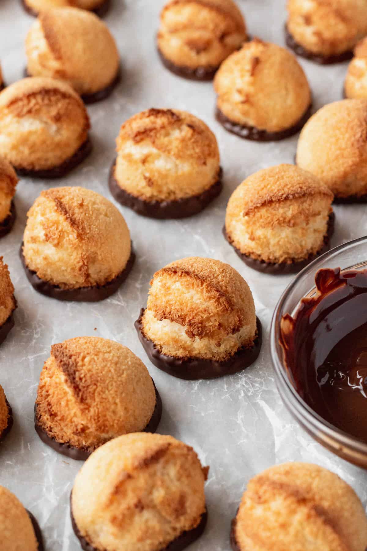 Coconut macaroons with the bottoms dipped in chocolate.