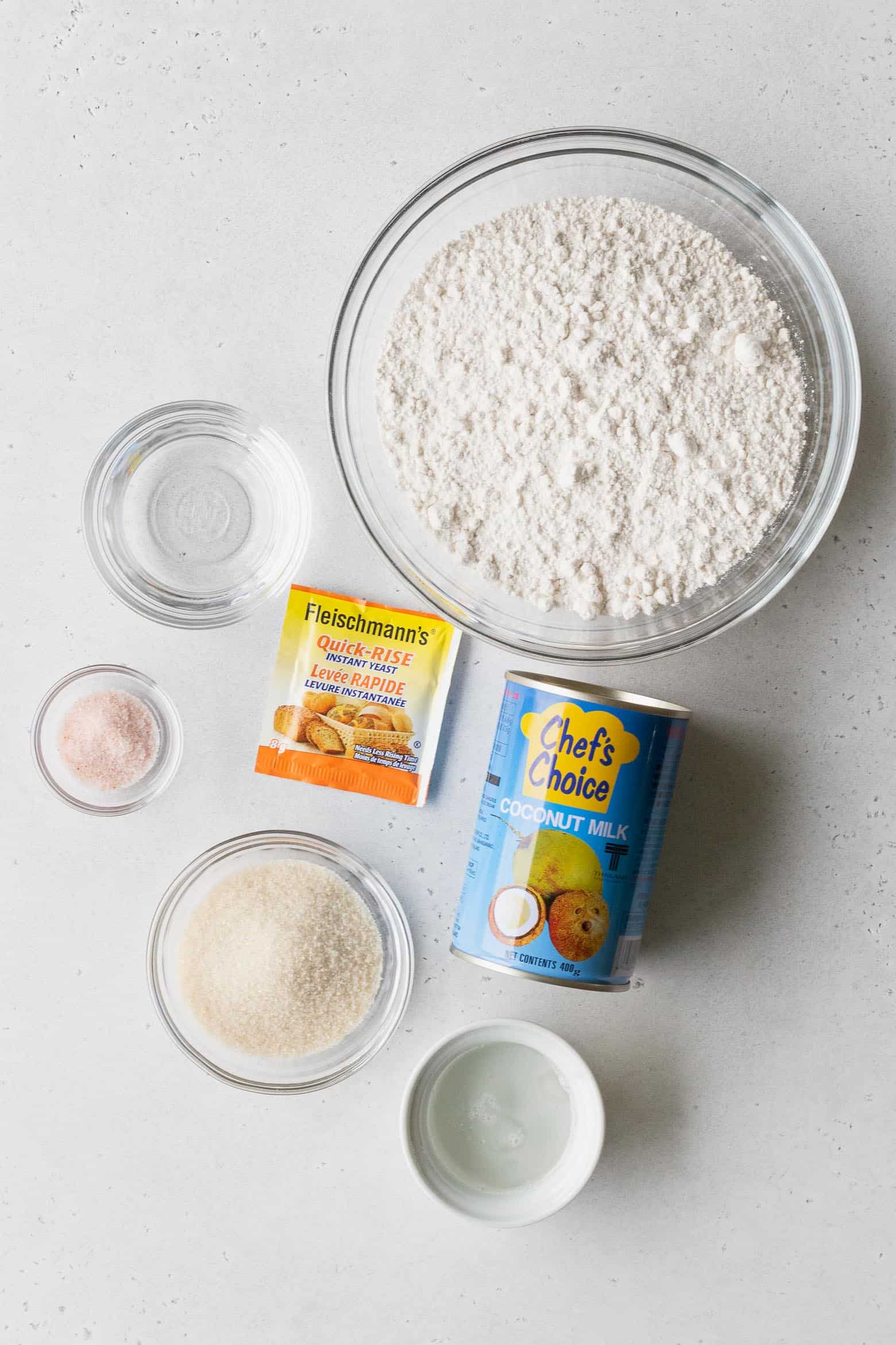 Ingredients to make pani popo measured out into bowls.