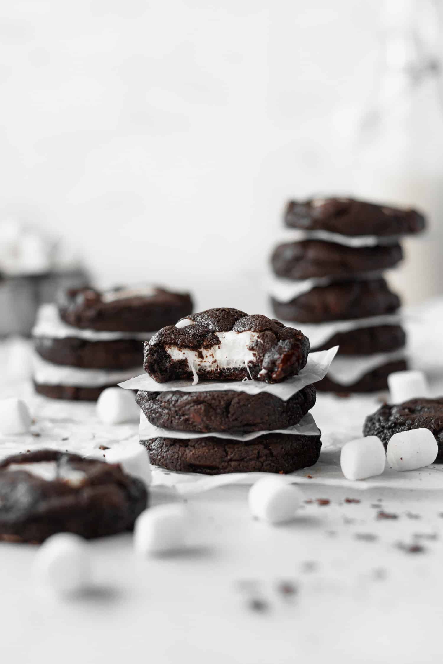 Stacks of marshmallow stuffed gluten-free chocolate cookies